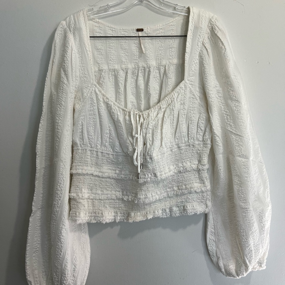 Free people white ruffle blouse